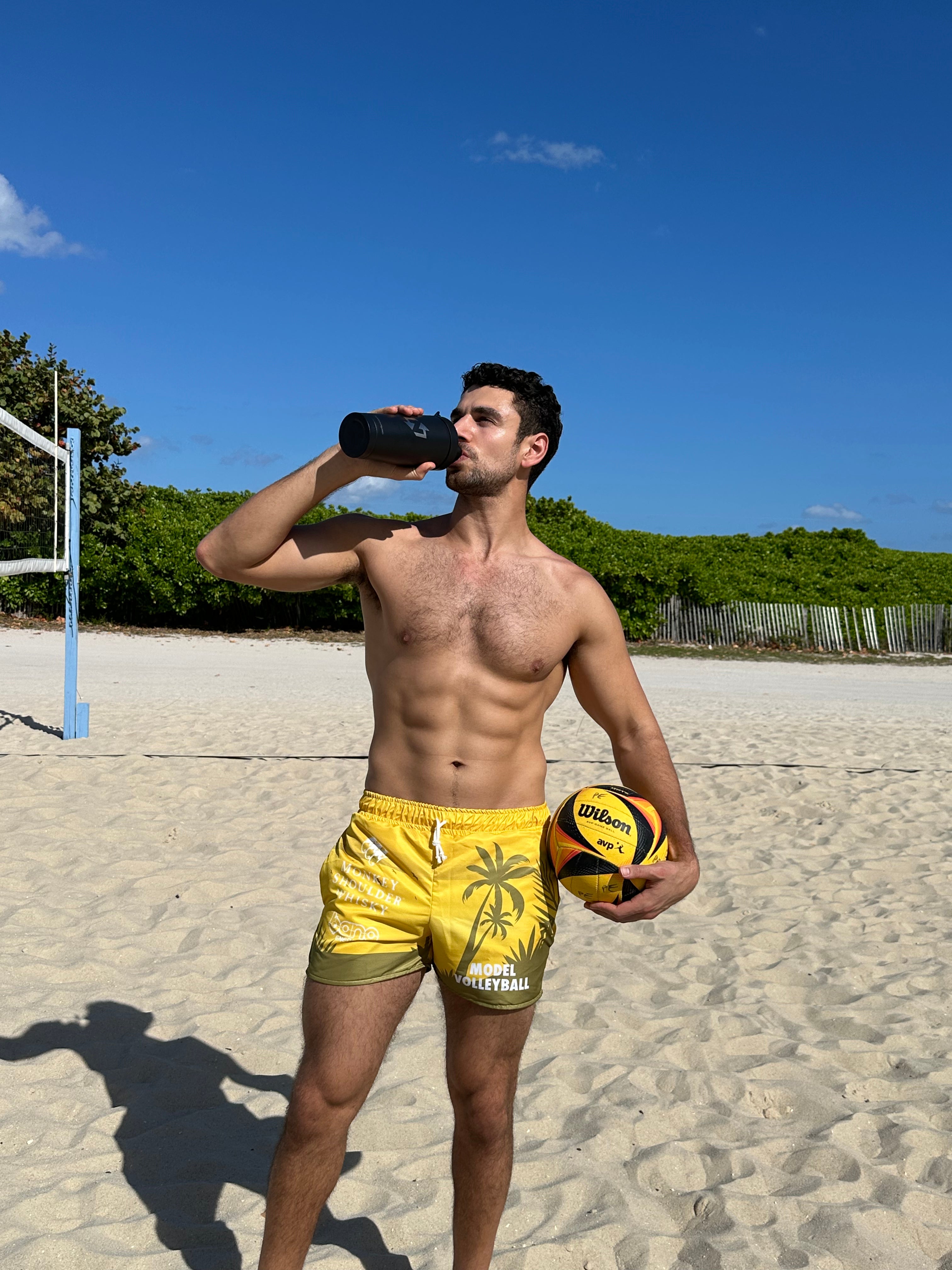 Gabe_with_steel_bottle_on_beach_V1.heic