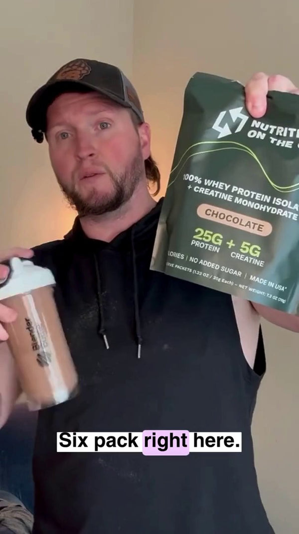 Brett G. holding a Nutrition On The Go 6-pack and a shaker