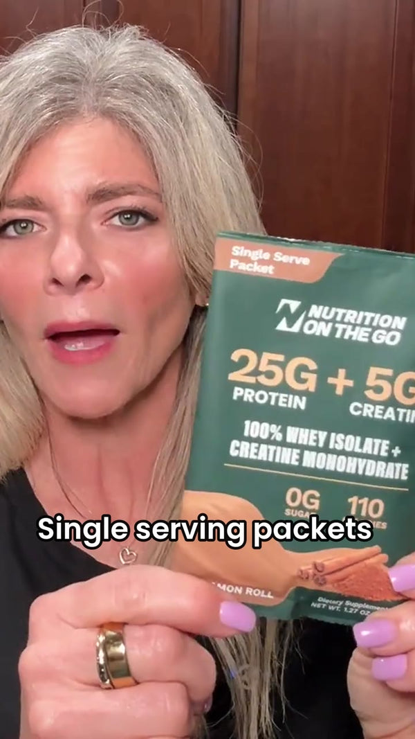 Creator holding a Nutrition On The Go Cinnamon Roll packet